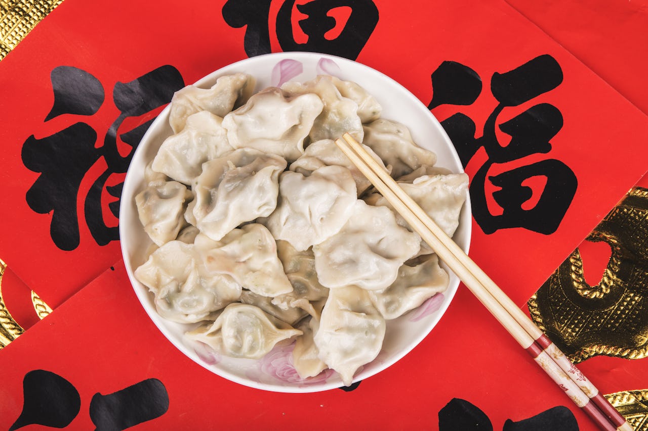 why do you eat dumplings on chinese new year